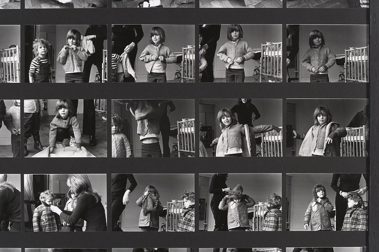 Mierle Laderman Ukeles, Dressing to Go Out/Undressing to Go In, 1973, detail. Black-and-white photos mounted on foam core with chain and dust rag, 55 x 42 1/4 inches. Original black-and-white photographs: Joshua Siderowitz. Installation photo: Jeffrey Sturges © Mierle Laderman Ukeles. Courtesy the artist and Ronald Feldman Gallery, New York, NY