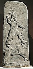 תבליט של האל הדד ניצב על פר, מאה 13 לפנה"ס, סוריה.